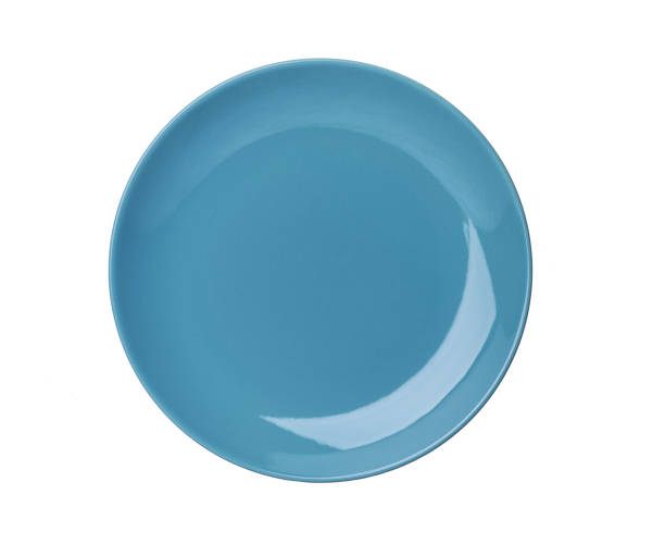 istock blue plate isolated on white background,top view 1423451810