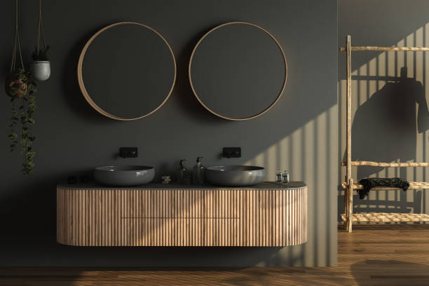 istock Modern bathroom interior with dark brown parquet floor, two black sinks, double mirrors, interior plants, dark walls. Minimalist bathroom with modern furniture. 3D rendering 1423454874