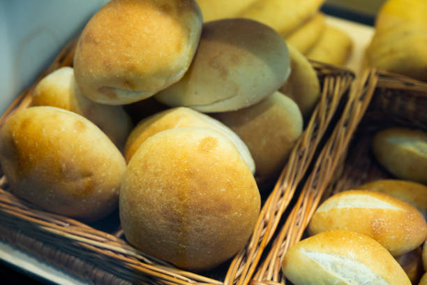 istock Delicious and fresh bread products lying on counter in bakery 1423458768