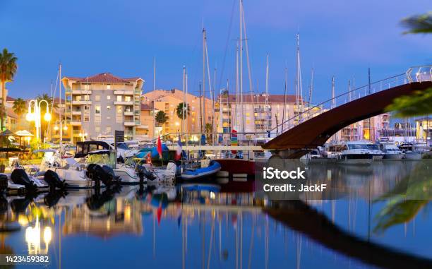 Evening View Of Coastal Area Of Frejus With Illuminated Quays And Port Stock Photo - Download Image Now