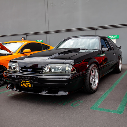 Los Angeles, CA, USA – August 21, 2022: Front Driver Quarter Detail Shot of Third Generation Ford Mustang at Hot Wheel Legends Tour and nothing else is happening in the image