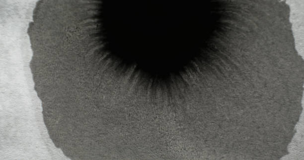 istock black water ink drop paint stain dirt blot paper 1423473138