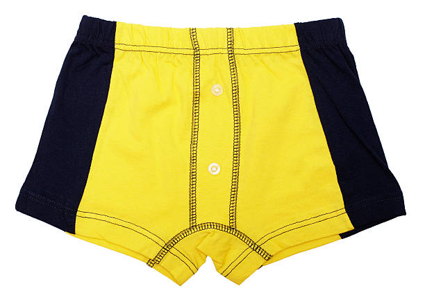 istock Yellow pants for a child on white 142347795