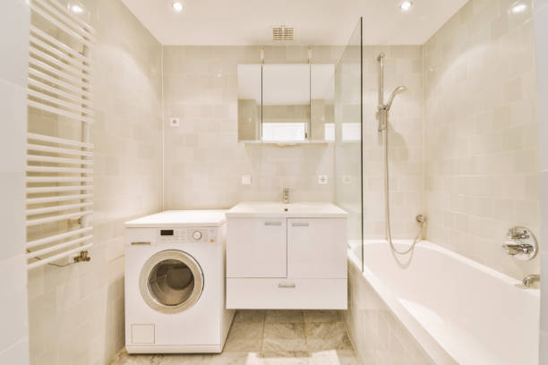 istock Bathroom surrounded by white tiles in a modern house 1423483386