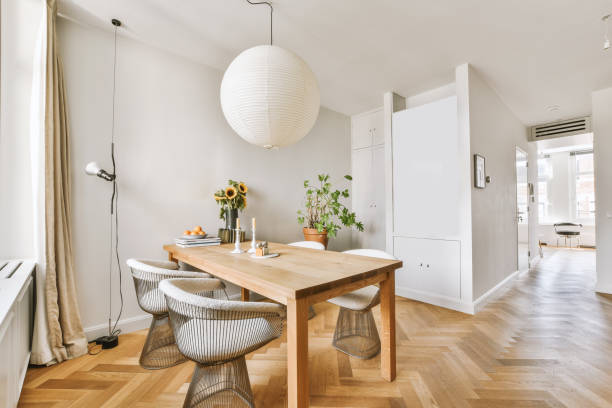 istock Cozy dining area under a spherical chandelier 1423483416