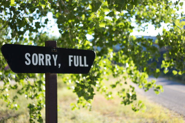 istock Taos, NM: Roadside Sign at Campsite Reading SORRY FULL 1423485956