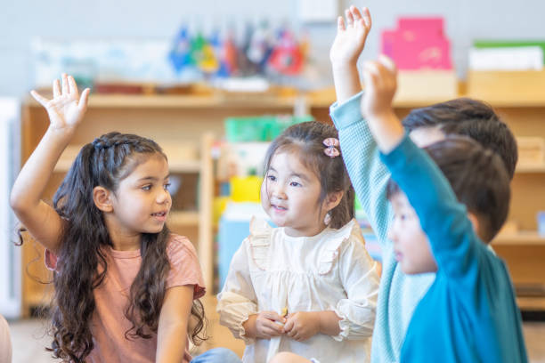 istock Montessori Children Asking Questions 1423498840