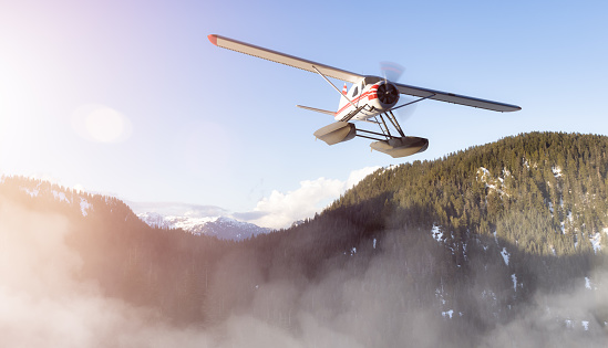 Seaplane flying over Canadian Mountain Nature Landscape. 3d Rendering Airplane Adventure Concept. Background from Grouse Mnt, North Vancouver, British Columbia, Canada.