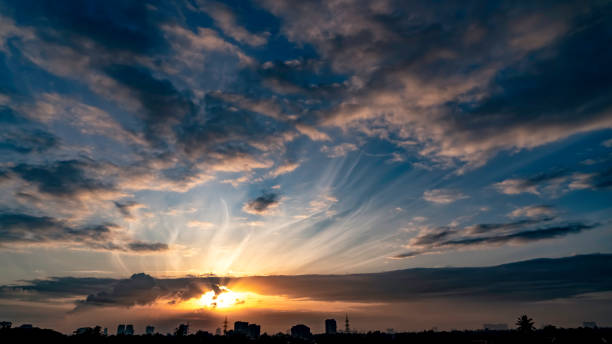 istock Brilliant Sunrise on a silhouetted Urban Skyline 1423500695
