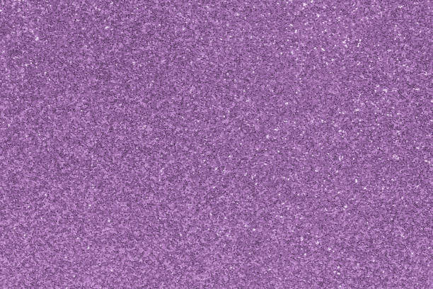 istock Glitter purple textured abstract background 1423503729