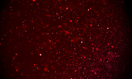 Abstract red defocus glitter background. Ideal as Christmas theme,card,wallpaper etc.,
