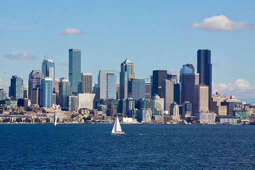The water view of the skyline of Seattle complete with sailboats