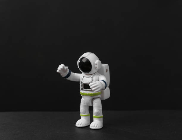istock Toy astronaut on a black background 1423510457