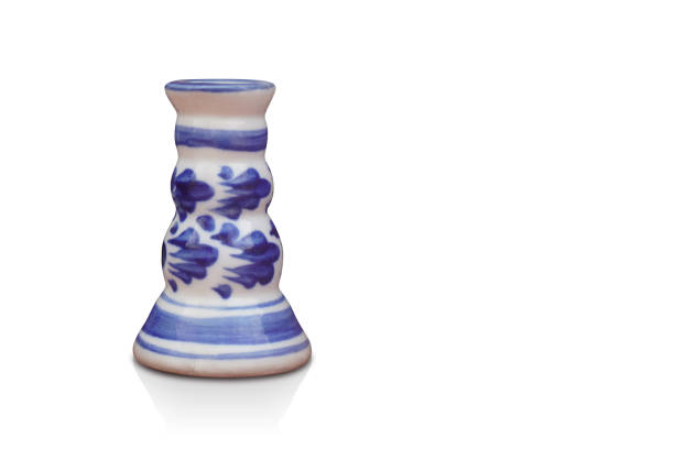 istock antique blue and white ceramic small cup on the white floor, object, decor, antique, dirty, vintage, retro, copy space 1423513714