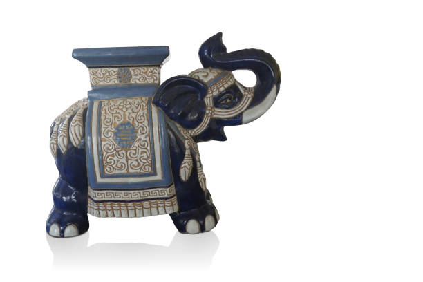 istock side view antique blue and white ceramic elephant on white background, animal, vintage, background,object, ancient,copy space 1423513748