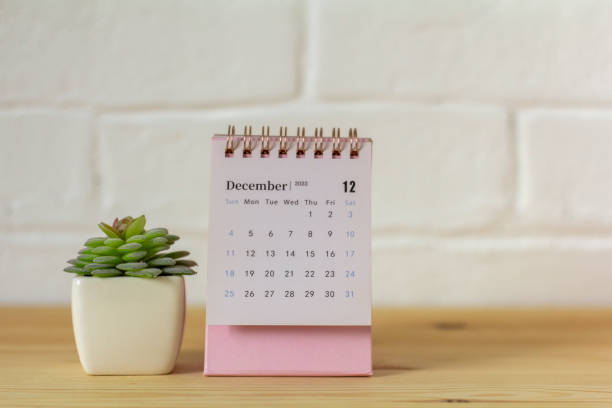 istock Hello, December.The calendar for December 2022 is on the table. 1423519333