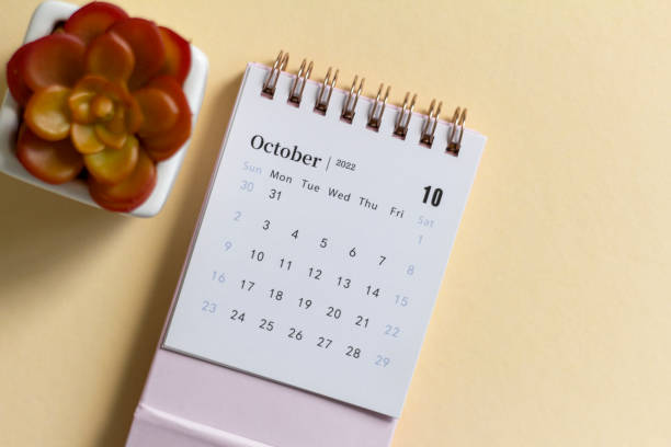 istock Hello October.Desktop calendar for October 2022 on a light background. 1423519336