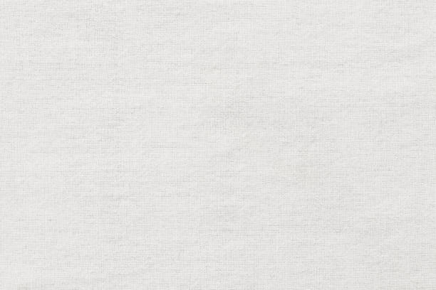 fundo branco da textura da tela de algodão, teste padrão sem emenda da matéria têxtil natural. - embroidery canvas beige close up - fotografias e filmes do acervo