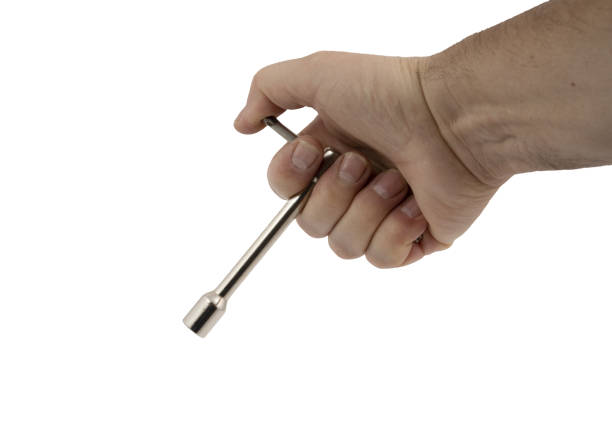 istock A socket wrench in the hand of a man on a transparent background 1423522964