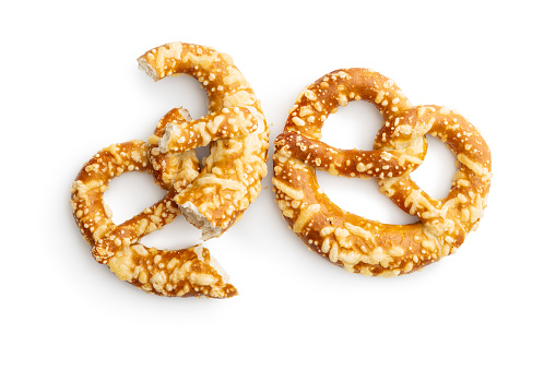 German bread pretzel with baked cheese isolated on the white background.