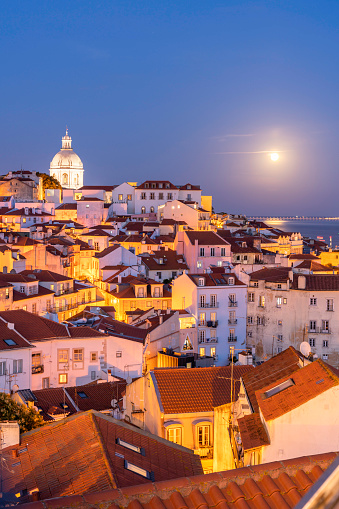View of the typical Alfama neighborhood in Lisbon, Portugal - dome of the national pantheon