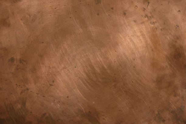 istock Copper background. Traces of sandpaper on the copper surface. 1423531490