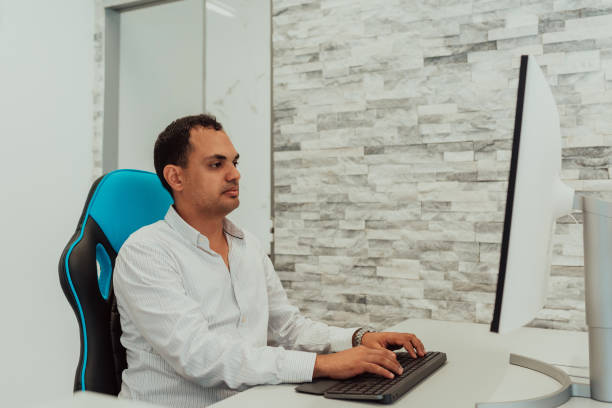 istock An architect works at a computer in an office.High quality photo 1423537018