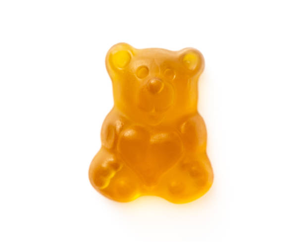 istock Brightly colored gummy bear on white background 1423537071