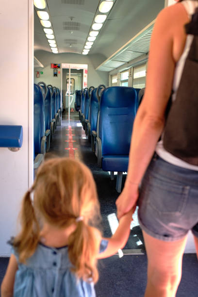 istock Young family is boarding a train 1423538219