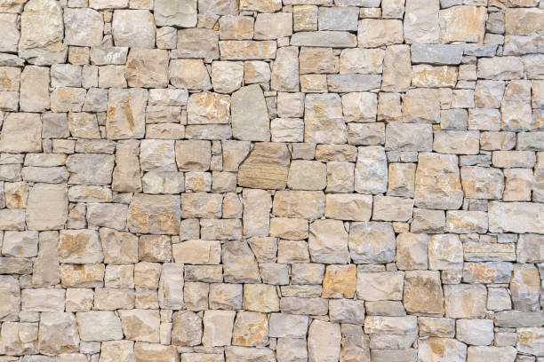 istock Wall texture with masonry of beige color 1423538861