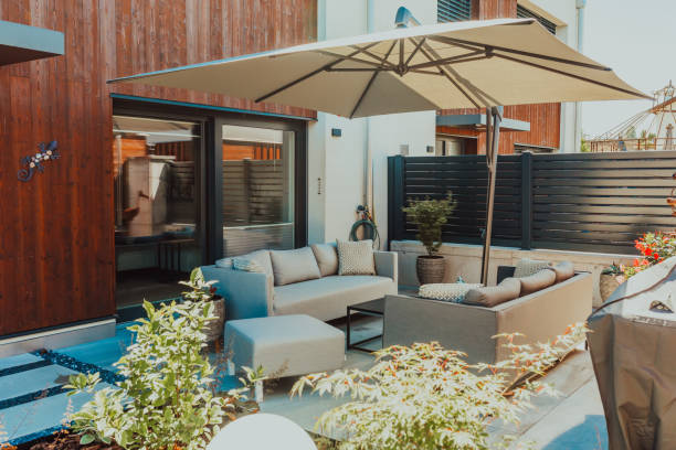 istock Luxurious yard in front of a modern smart house 1423540355