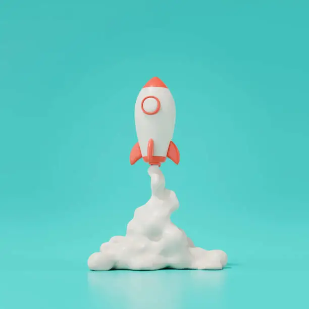Photo of 3d render of rocket launch isolated on green background.