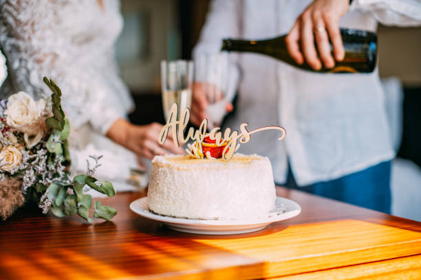 bride and groom celebrate their marriage with champagne - wedding champagne table wedding reception imagens e fotografias de stock