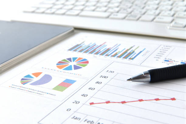 istock Business chart and graph with ballpoint pen 1423542212