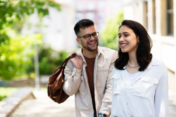 istock Boyfriend and girlfriend having fun at the park. 1423544571
