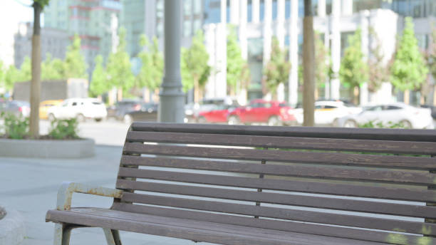 istock Empty Bench on Street in the Moning 1423549479