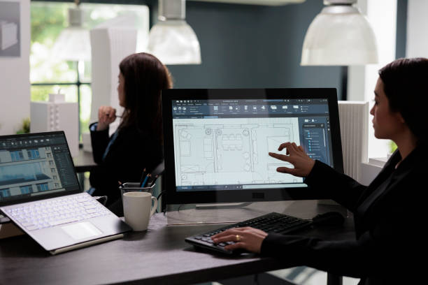 Real estate agent planning room floor in software, drafting Real estate agent planning room floor in software, drafting, home interior wireframes on computer monitor screen. Asian employee in architecture office, creating project blueprints. computer aided design stock pictures, royalty-free photos & images