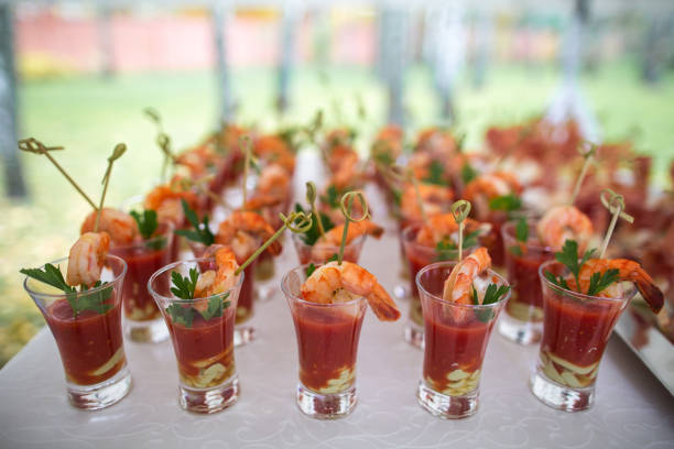 Row of appetizers and starters on the wedding table.