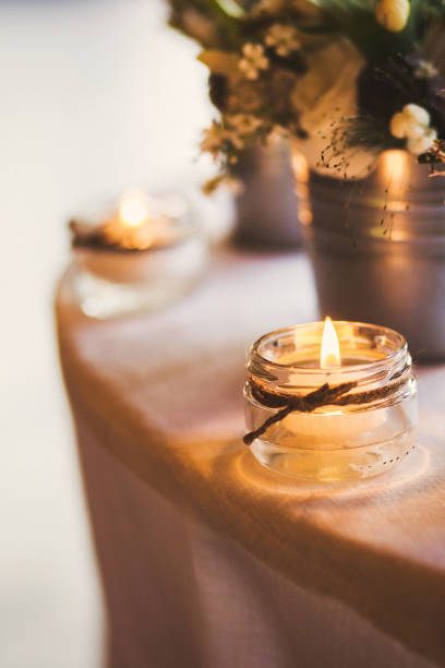 istock Candles on the table at the wedding party 1423554073