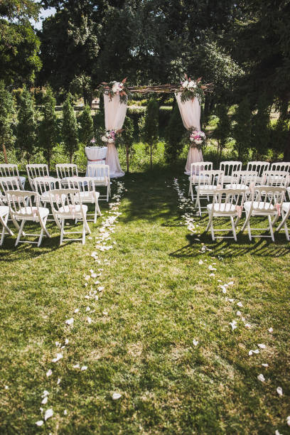 istock Outdoor wedding ceremony in a green garden 1423554081