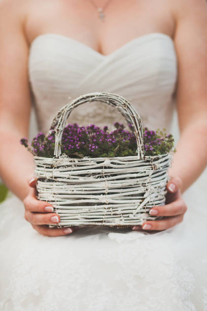 Bright wedding bouquet in hands of the bride