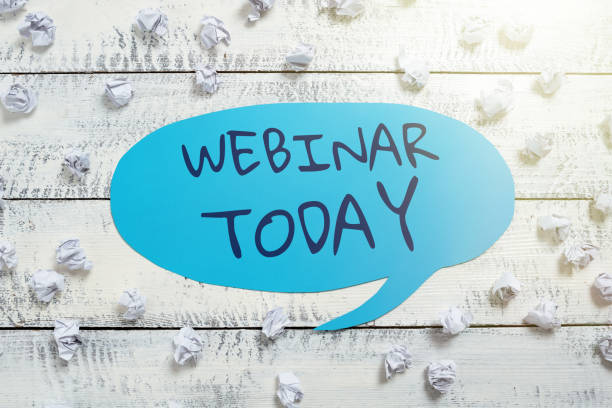 istock Conceptual caption Webinar Todaylive online educational presentation on different location. Business idea live online educational presentation on different location 1423555191