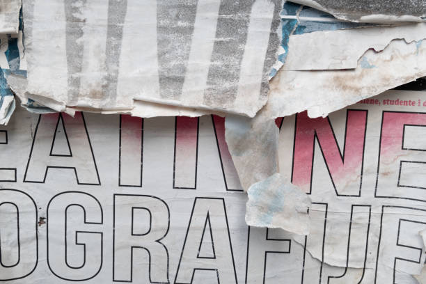 istock Torn and ripped old street poster background 1423556501