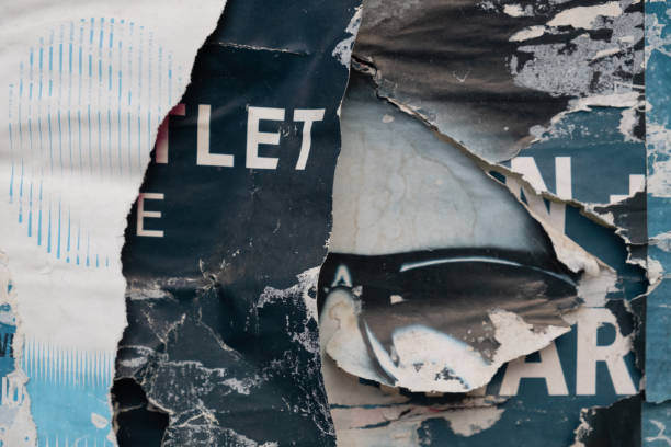 istock Torn and ripped old street poster background 1423556541
