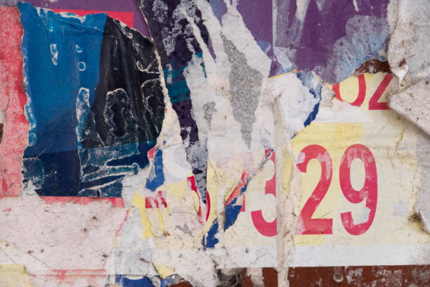 istock Torn and ripped old street poster background 1423556566