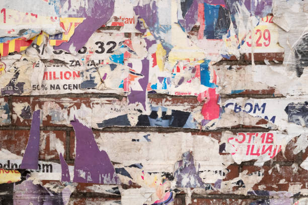 istock Torn and ripped old street poster background 1423556604