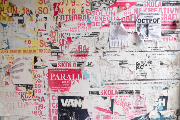 istock Torn and ripped old street poster background 1423556657