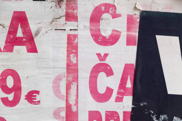 istock Torn and ripped old street poster background 1423556717