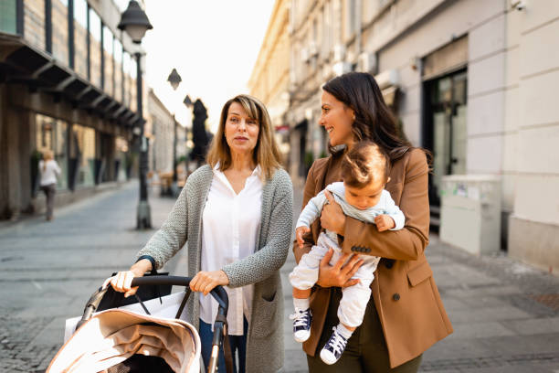 istock Enjoying the walk with daughter and grandson 1423557245