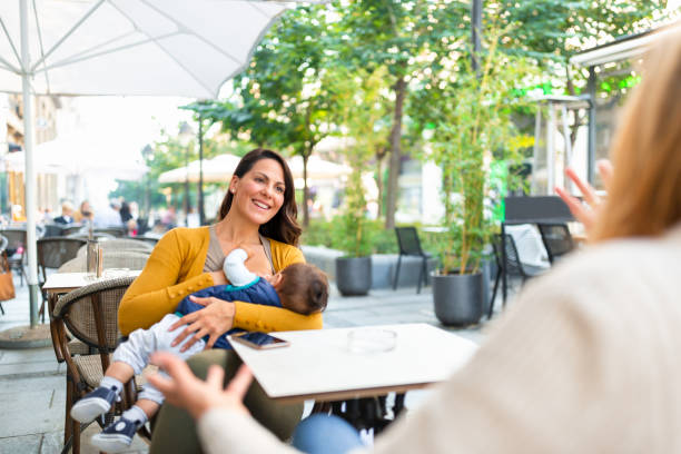 istock Breast feeding in public place 1423557730